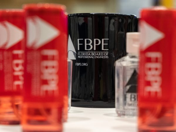 In addition to a USB drive loaded with information for building officials, FBPE handed out branded coffee mugs and other items at the Building Officials Association of Florida's 2022 annual conference.