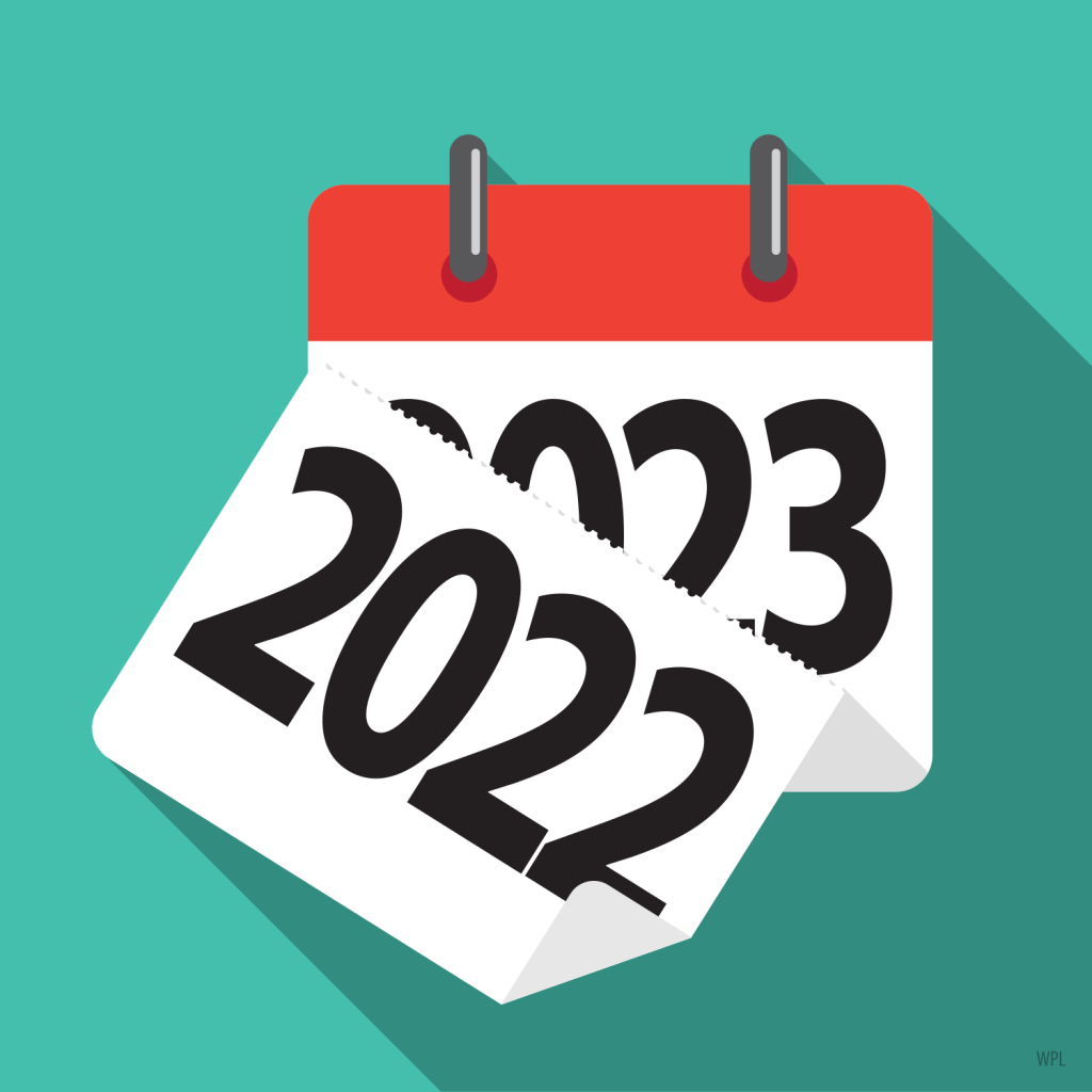 A calendar flips from 2022 to 2023